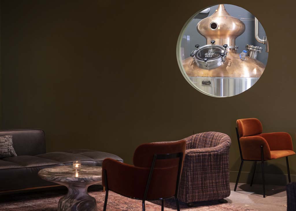 Town and Ranch lounge with view into distillery